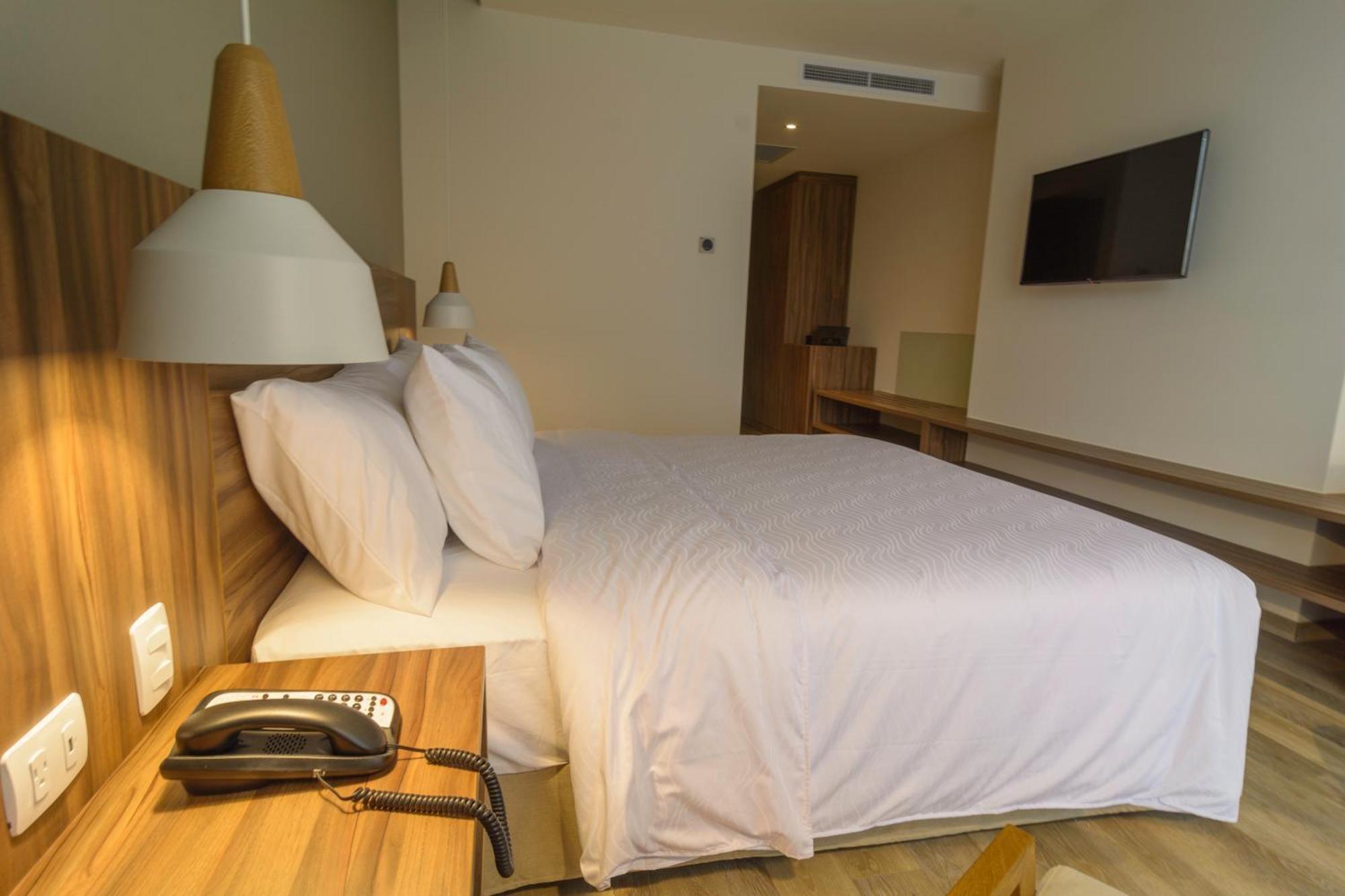 Novotel Medellin El Tesoro Exterior photo A room at the hotel