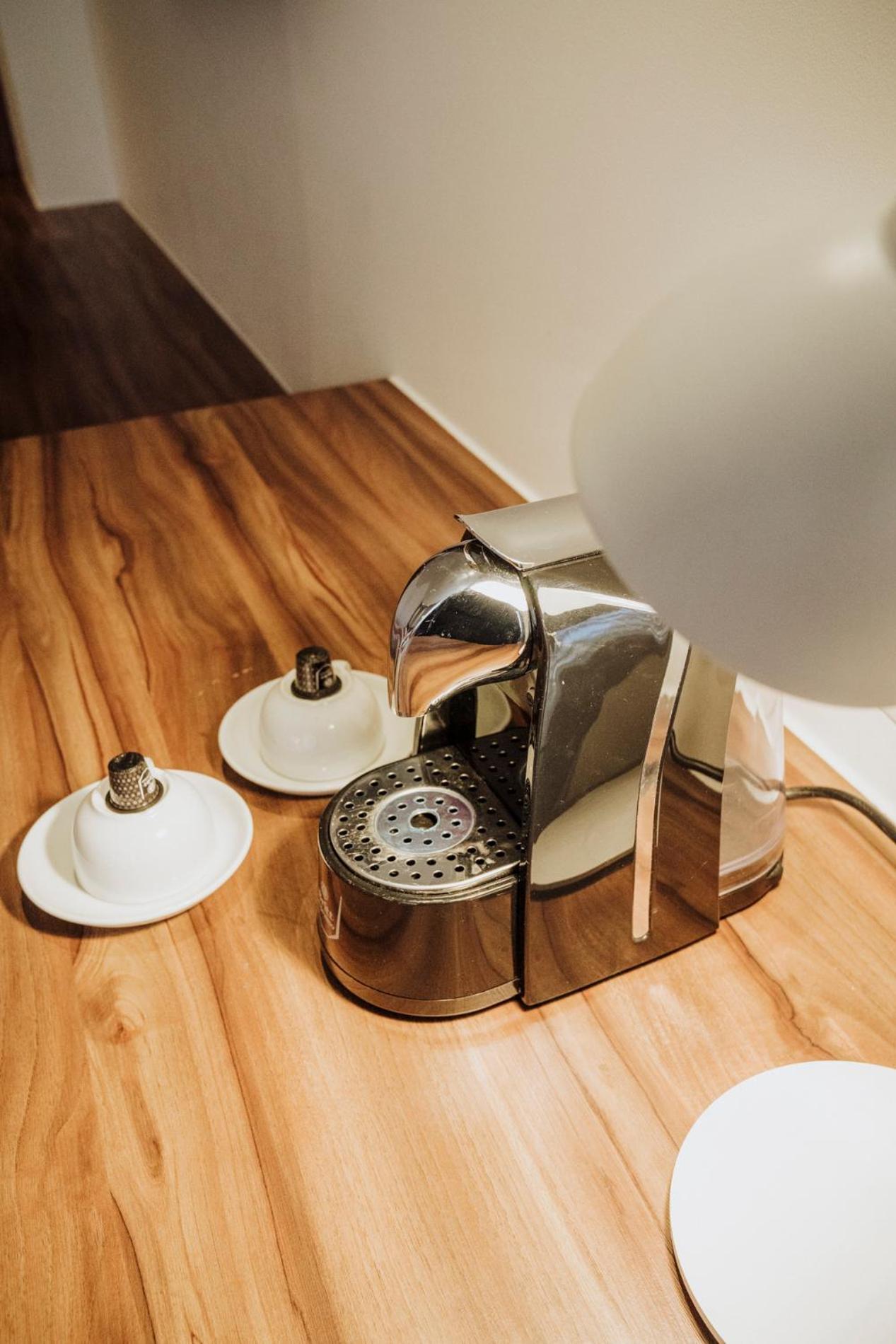 Novotel Medellin El Tesoro Exterior photo A Nespresso coffee machine