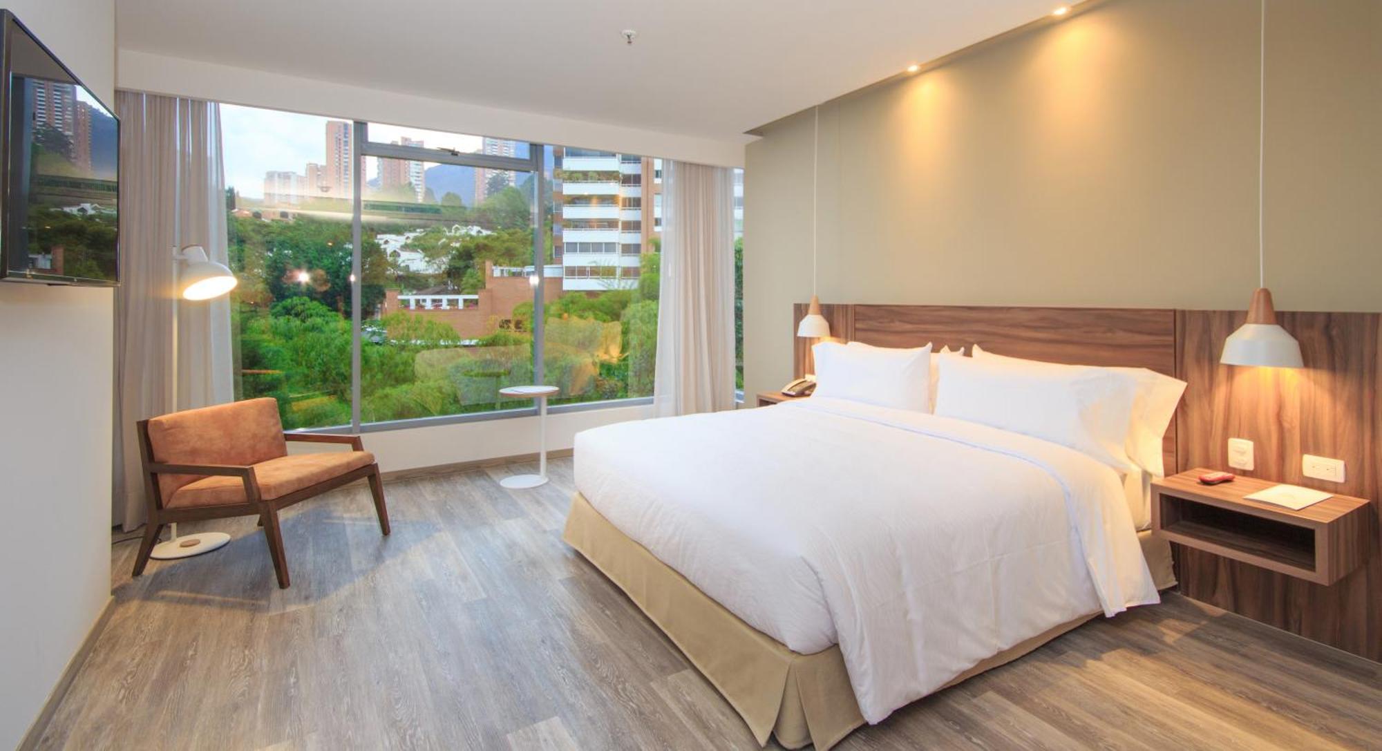 Novotel Medellin El Tesoro Exterior photo A bedroom at the hotel