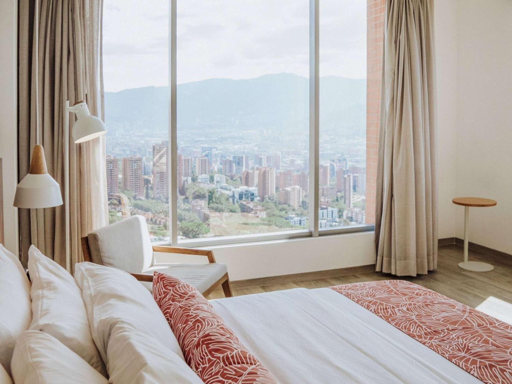 Novotel Medellin El Tesoro Exterior photo A bedroom at the hotel