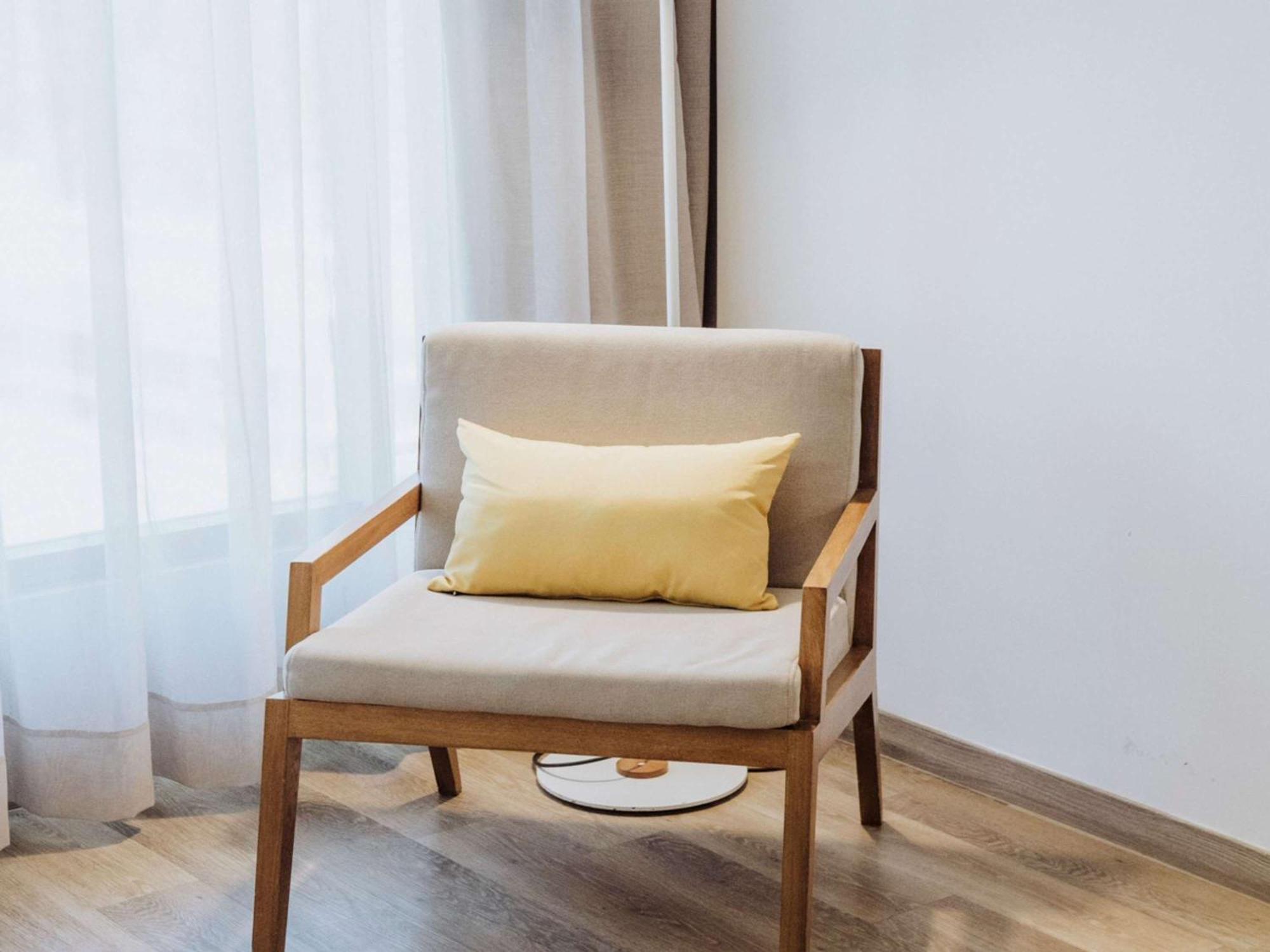 Novotel Medellin El Tesoro Exterior photo A chair with a cushion